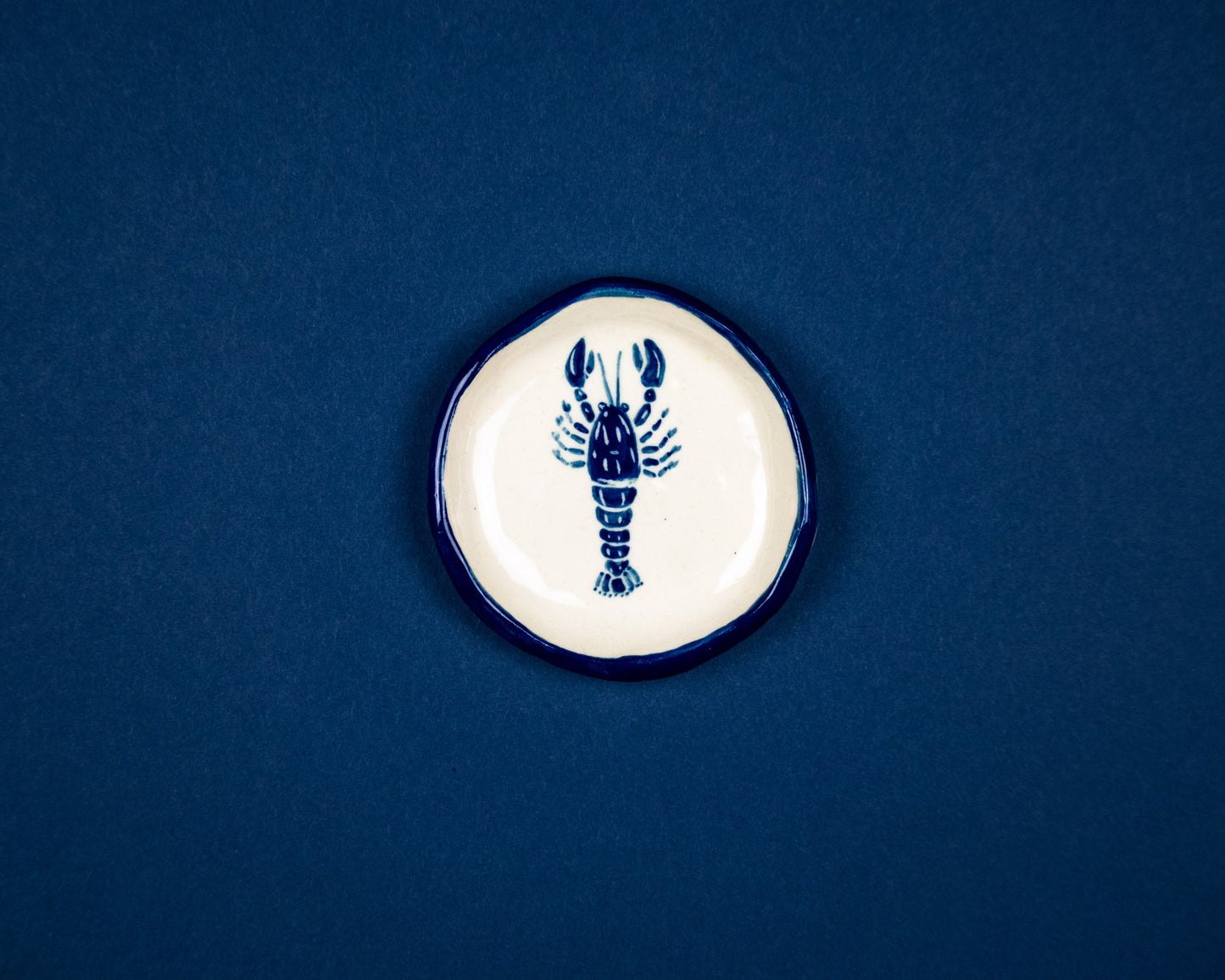 Blue Lobster with striped rim